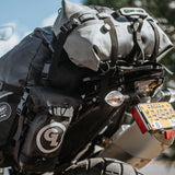 Giant Loop Rogue Dry Bag fitted to luggage on bike