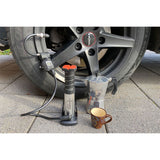 Mini Foot Pump with Digital Manometer in use on a car tyre