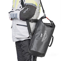 Givi Cylindrical Roll Top WP Bag 25L being carried