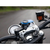 Quad Lock Vibration Dampener out on a bike