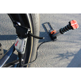 Mini Foot Pump with Analogue Manometer showing small size next to bike tyre