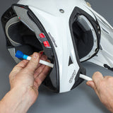 Kriega Hands-Free Hydration Kit being fitted to motorcycle helmet