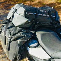 Giant Loop Tillamook Dry Bag attached to luggage on motorcycle
