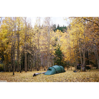 Hilleberg Kaitum 3 Tent (Green) is use in a forest clearing