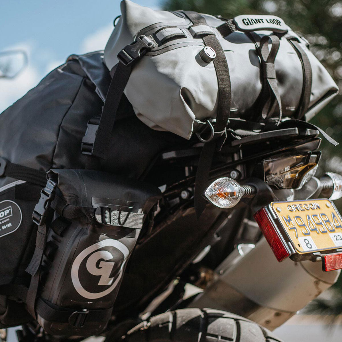 Giant Loop Rogue Dry Bag fitted to luggage on bike