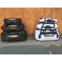 AltRider SYNCH Dry Bags stacked in various sizes and colours