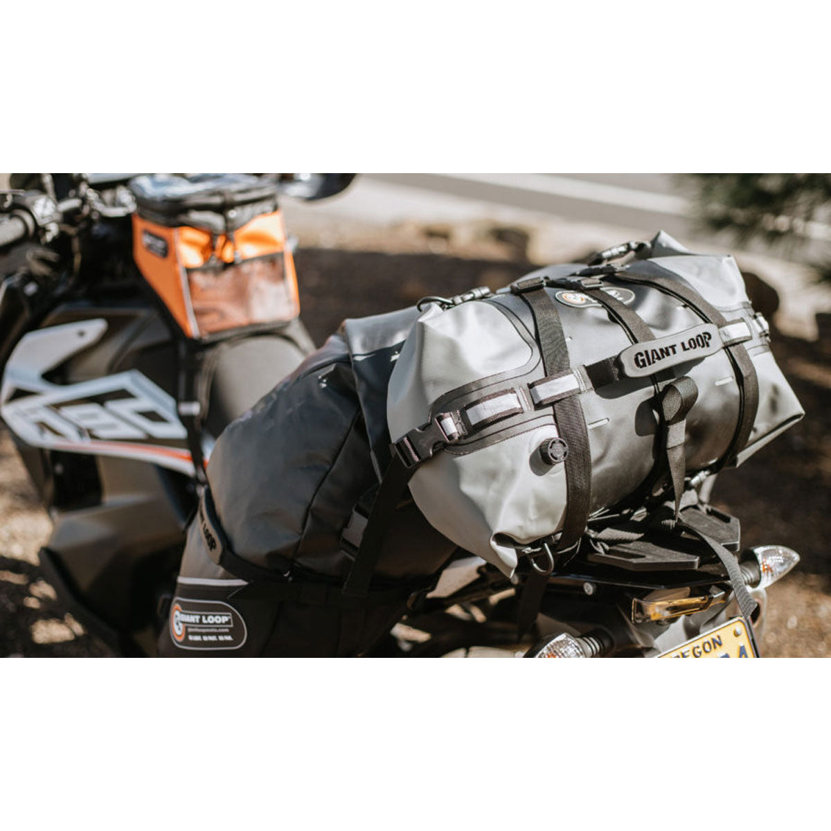 Giant Loop Rogue Dry Bag attached to Saddlebags on a motorcycle