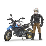 Scrambler Ducati Desert Sled Model Toy with rider standing next to bike