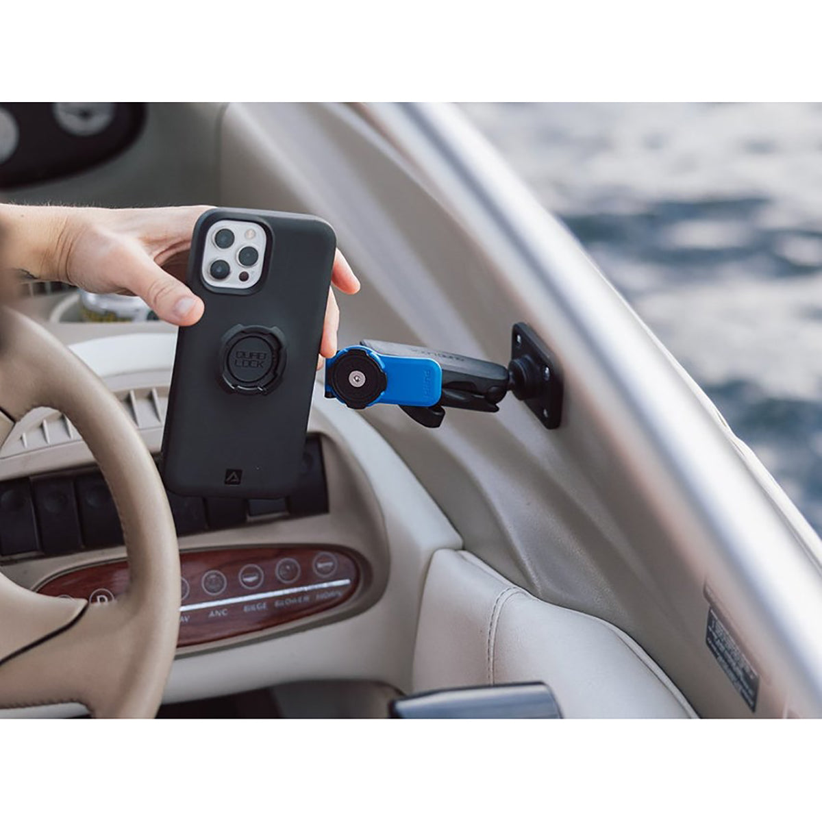 Quad Lock 360 Lever Head showing use in a car