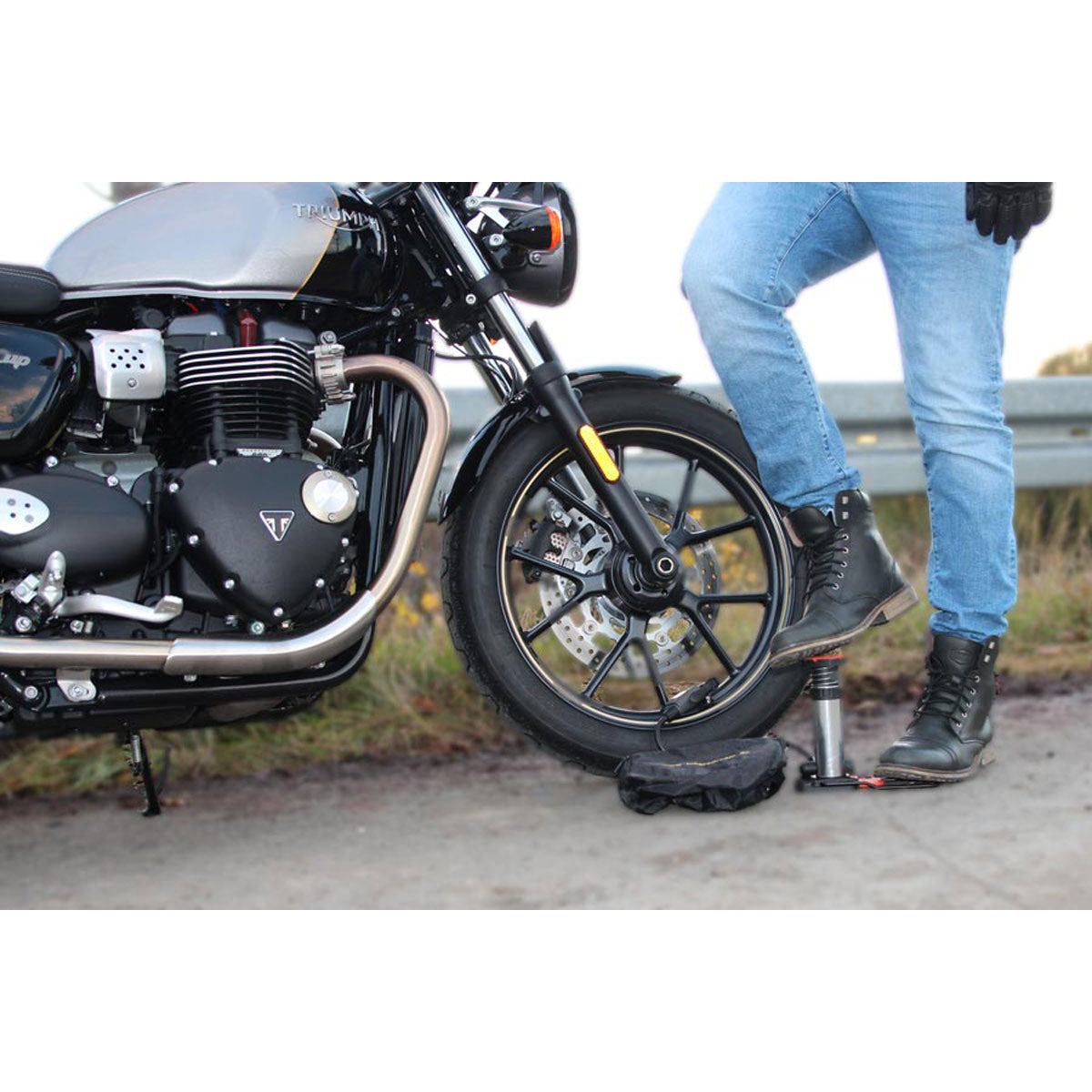 Mini Foot Pump with Digital Manometer in use on a motorcycle on the roadside