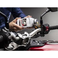IPONE DOT 4 Synthetic Brake Fluid in use in the workshop