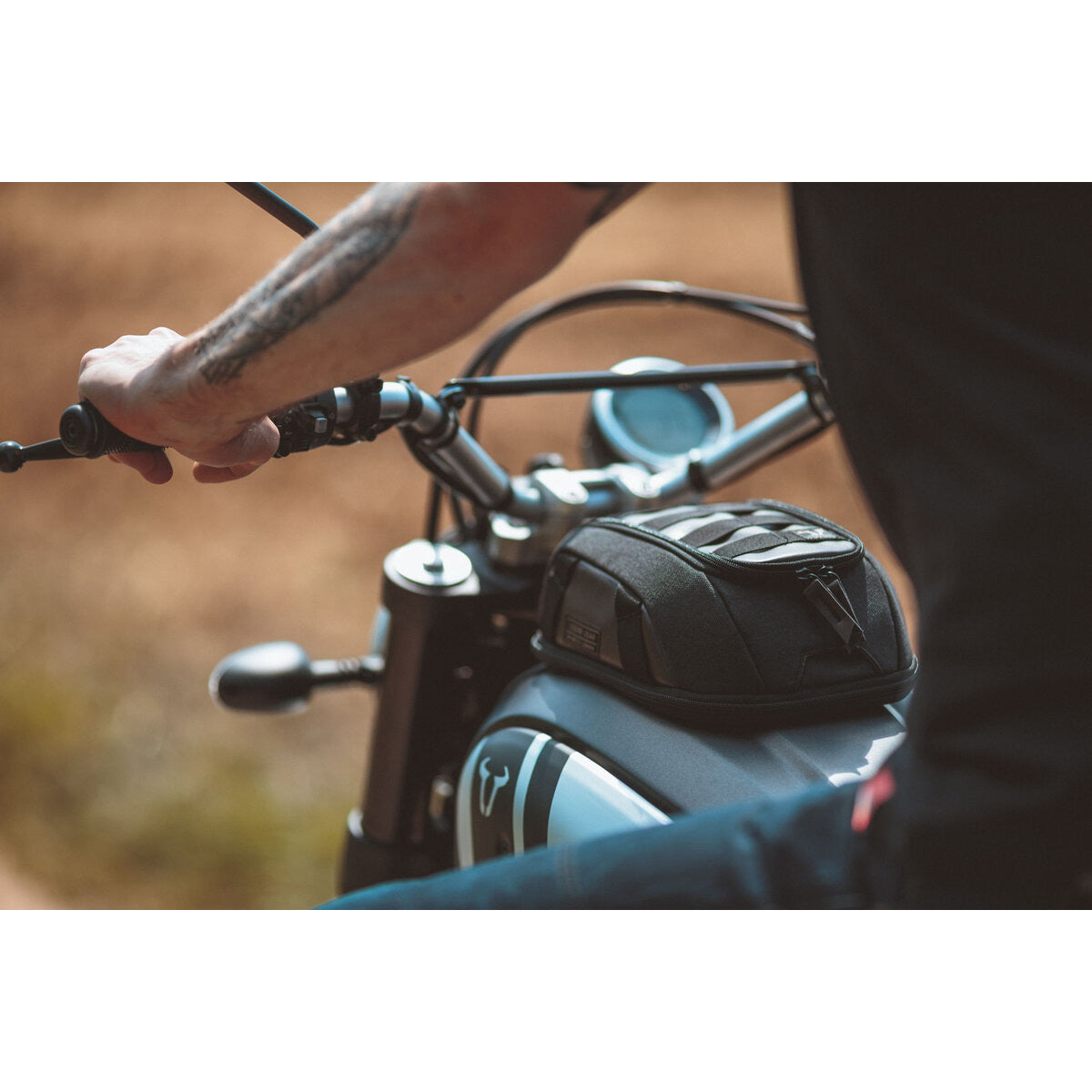 SW Motech Legend Gear Magnetic Tank Bag in use on the trails