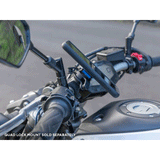 Quad Lock Vibration Dampener on a bike with phone from side view