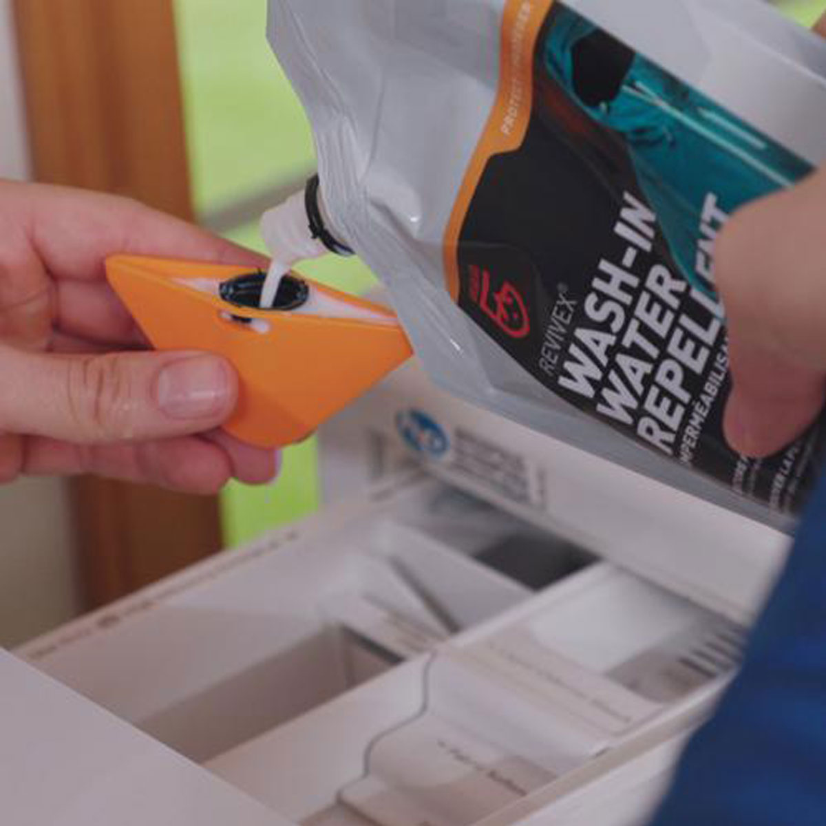 Gear Aid ReviveX Wash-In Water Repellent in use about to be washed